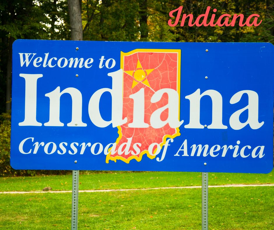Indiana welcome sign reading “Crossroads of America”