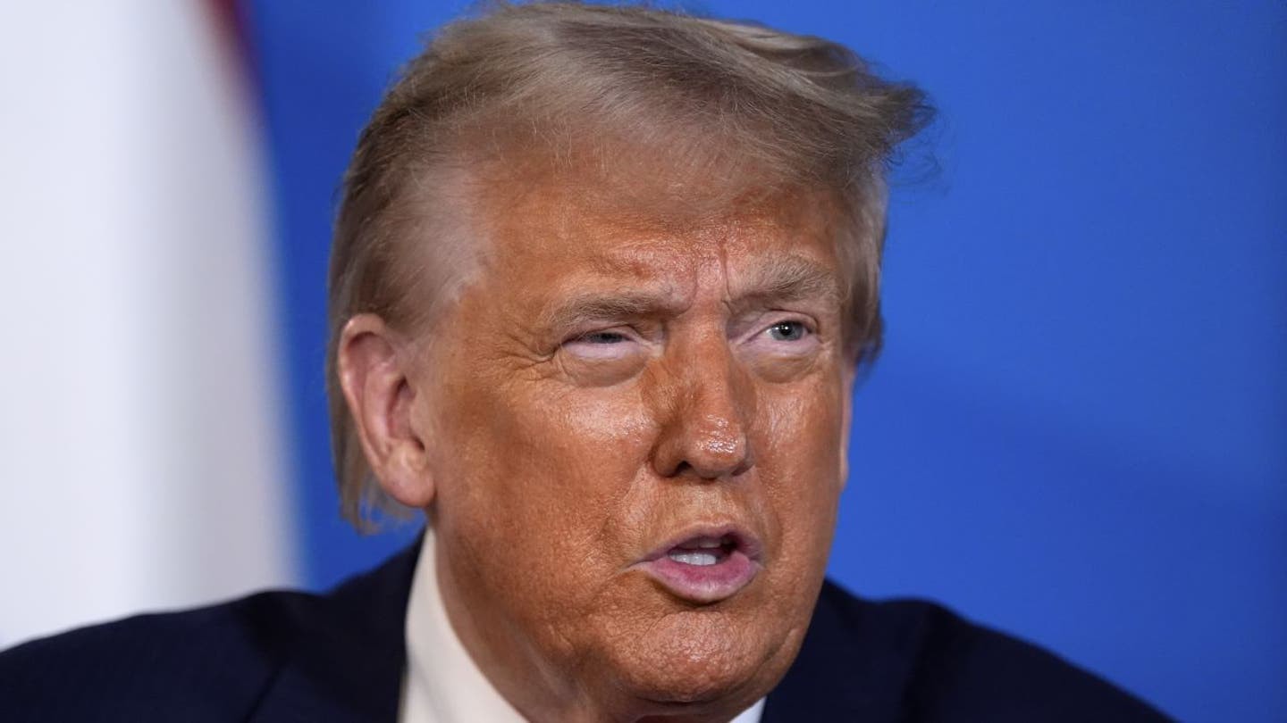 Donald Trump speaking at NATO summit after threatening Iran