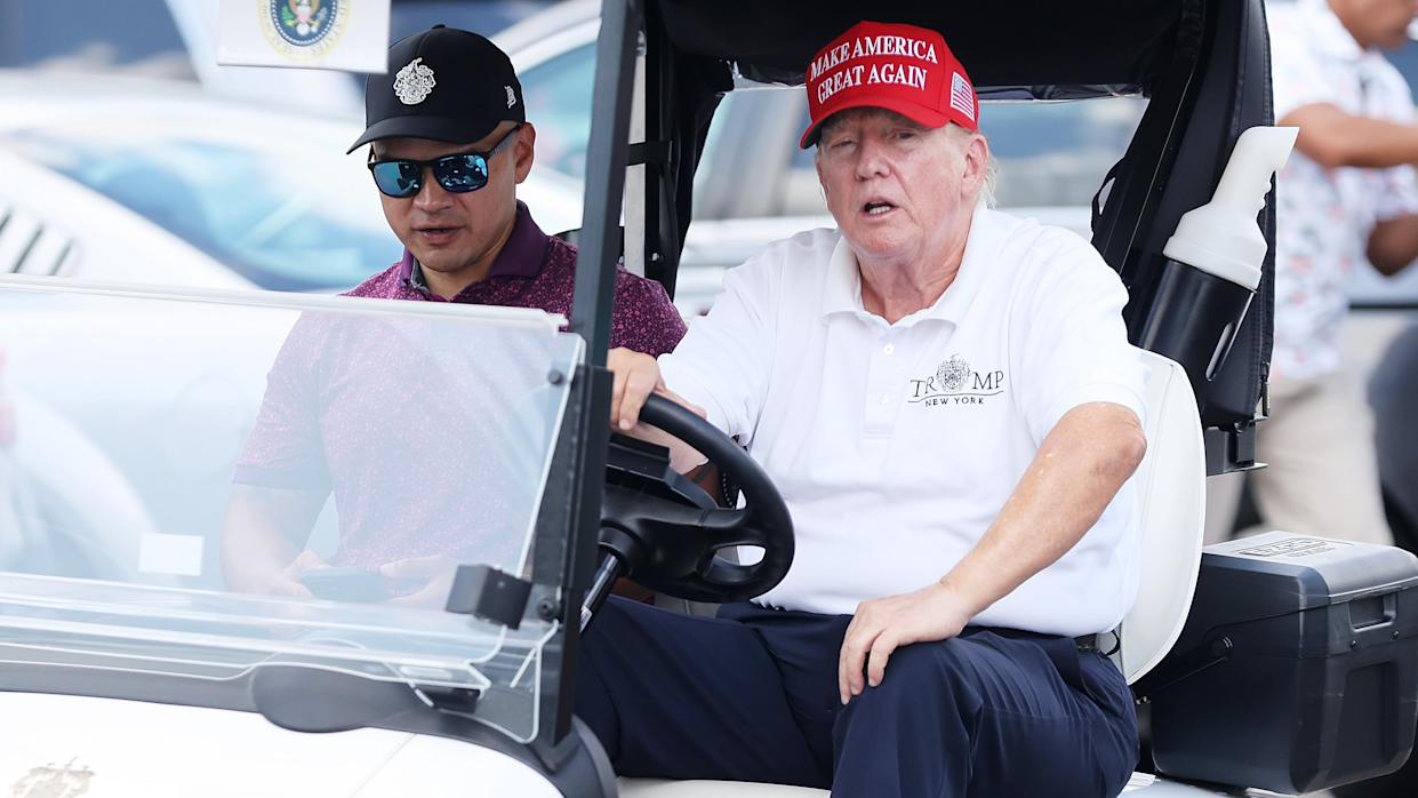 Donald Trump driving golf cart at Bedminster after failed health inspection
