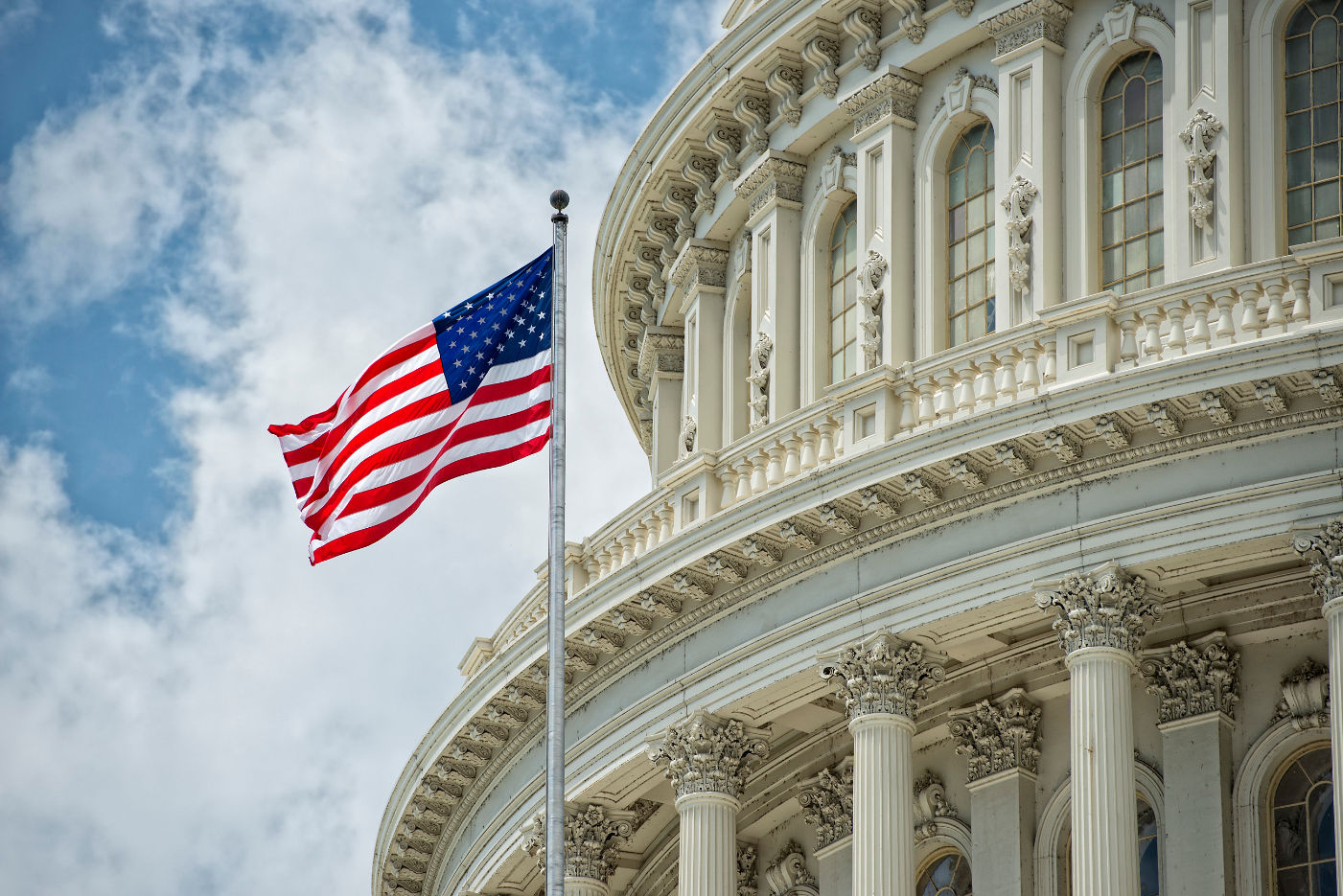 US Capitol Building with Waiving Flag