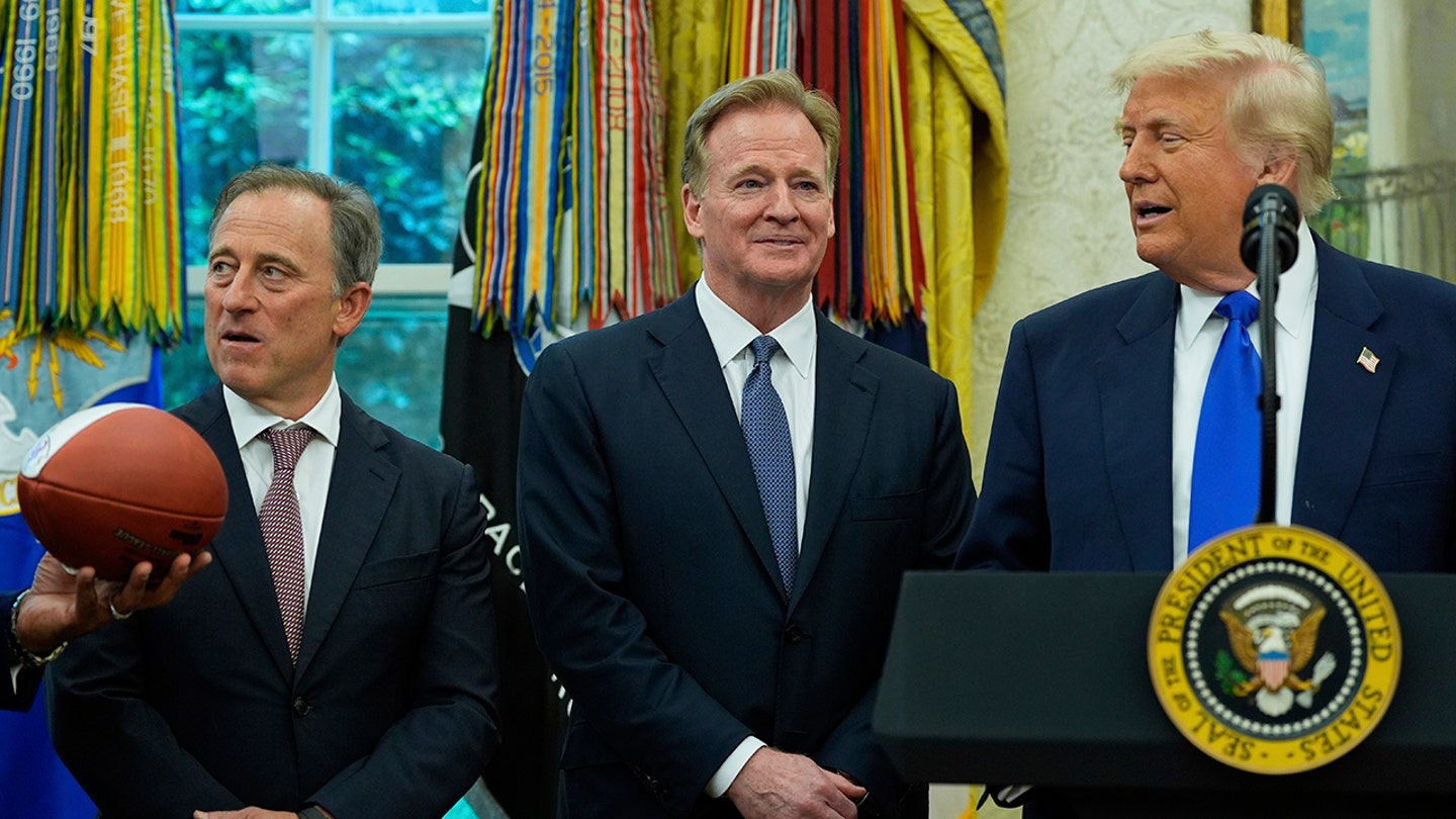 Trump in suit awkwardly holding a sports medal