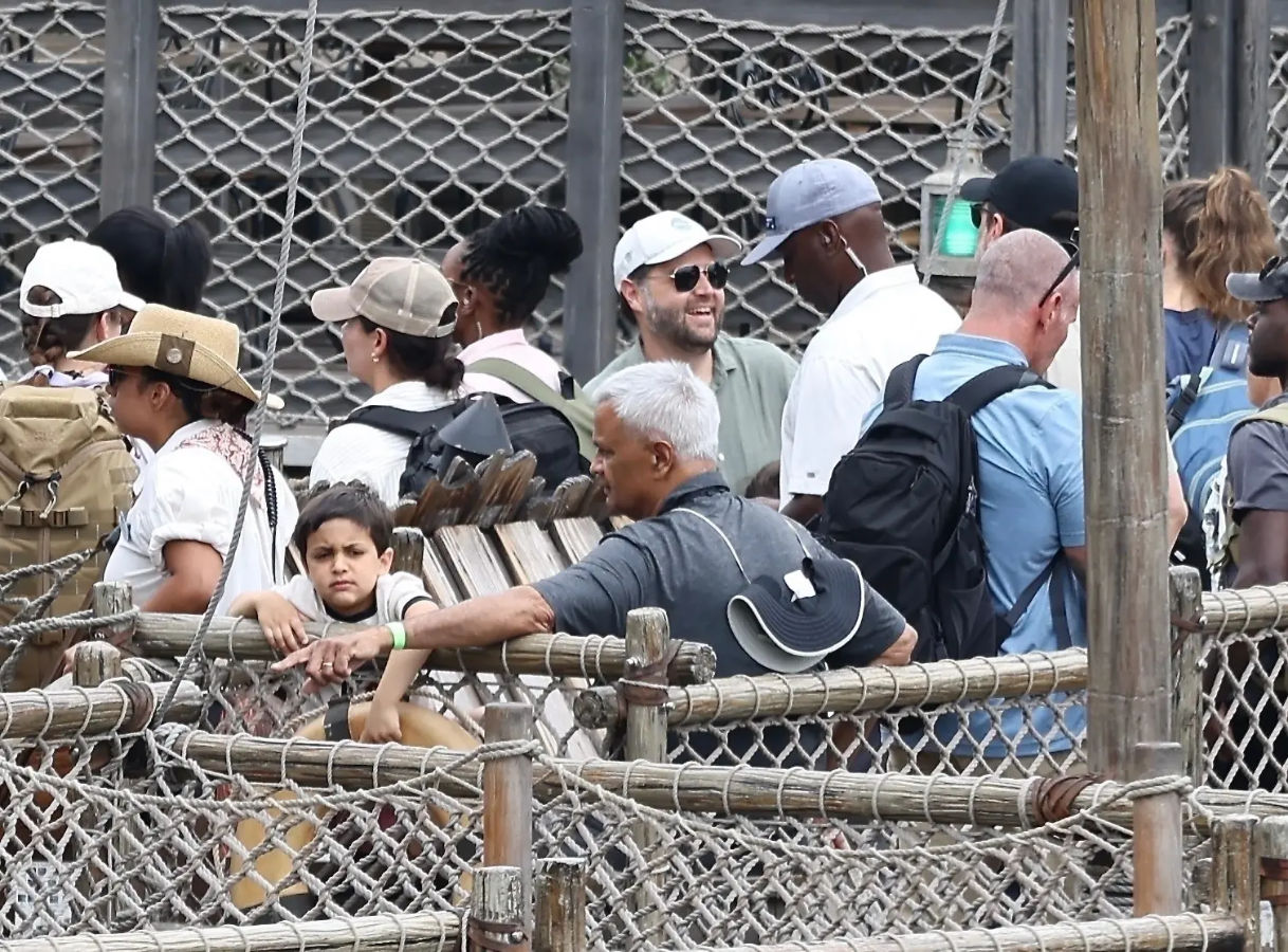 Vice President JD Vance mid-jog at Disneyland, surrounded by confused bystanders
