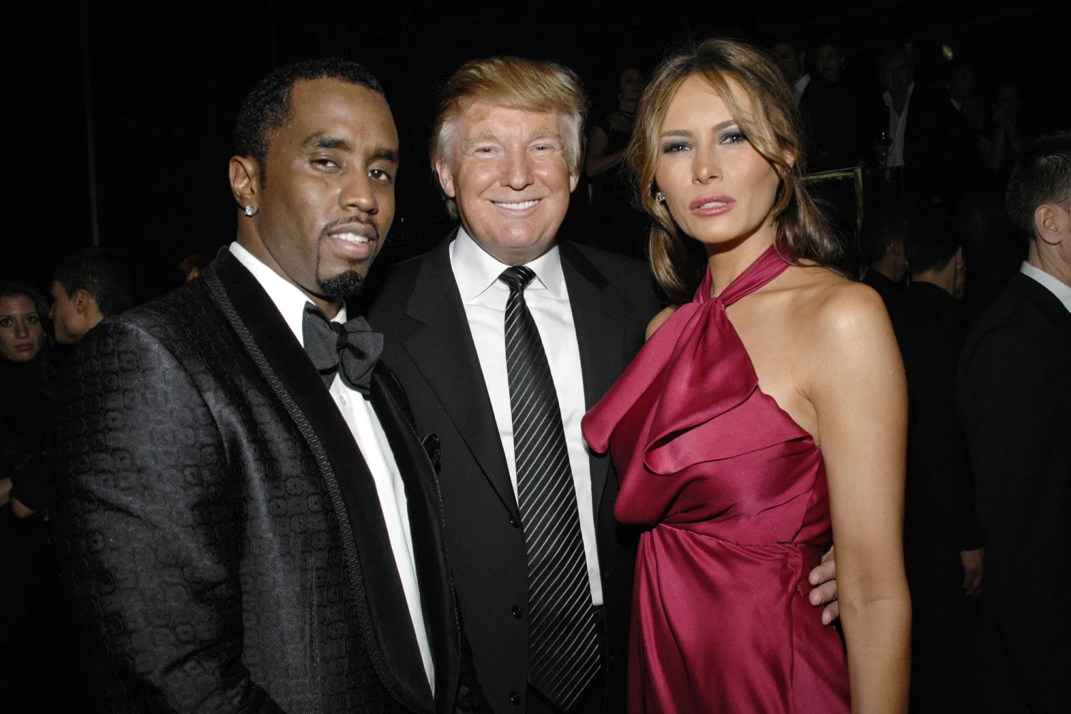 Donald Trump, Melania Trump, and Sean Combs at formal event
