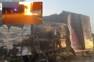Tractor trailer engulfed in flames on Missouri highway.