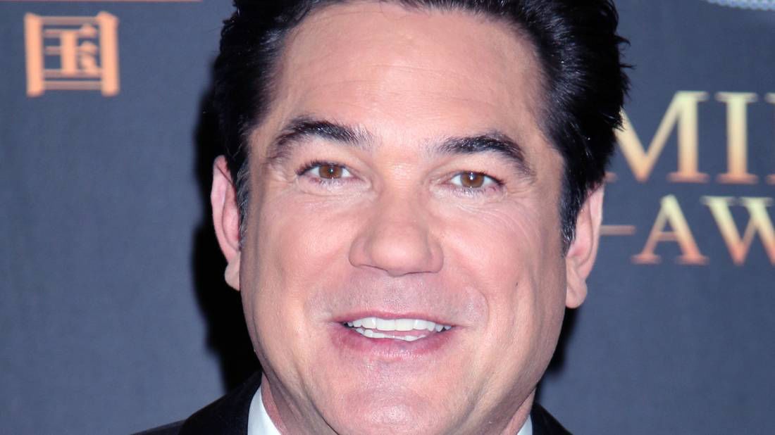 Dean Cain smiles on red carpet at awards event