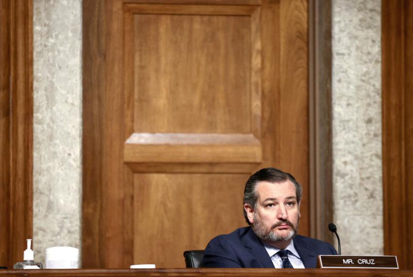 Ted Cruz sitting alone at Senate hearing