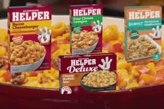 A pot of Hamburger Helper cooking on a stovetop.