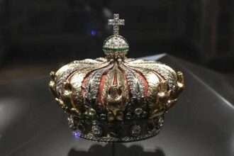 Ornate royal crown displayed inside the Louvre Museum before theft