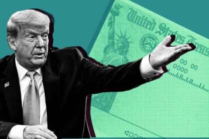 President Donald Trump gesturing with a stimulus check graphic in the background
