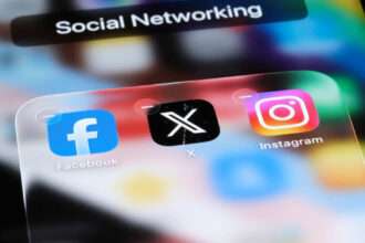 Smartphone displaying the X social media interface with engagement icons.