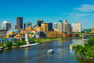Minneapolis skyline along the river on a clear day.
