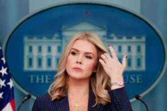 The White House press briefing room podium with official signage.
